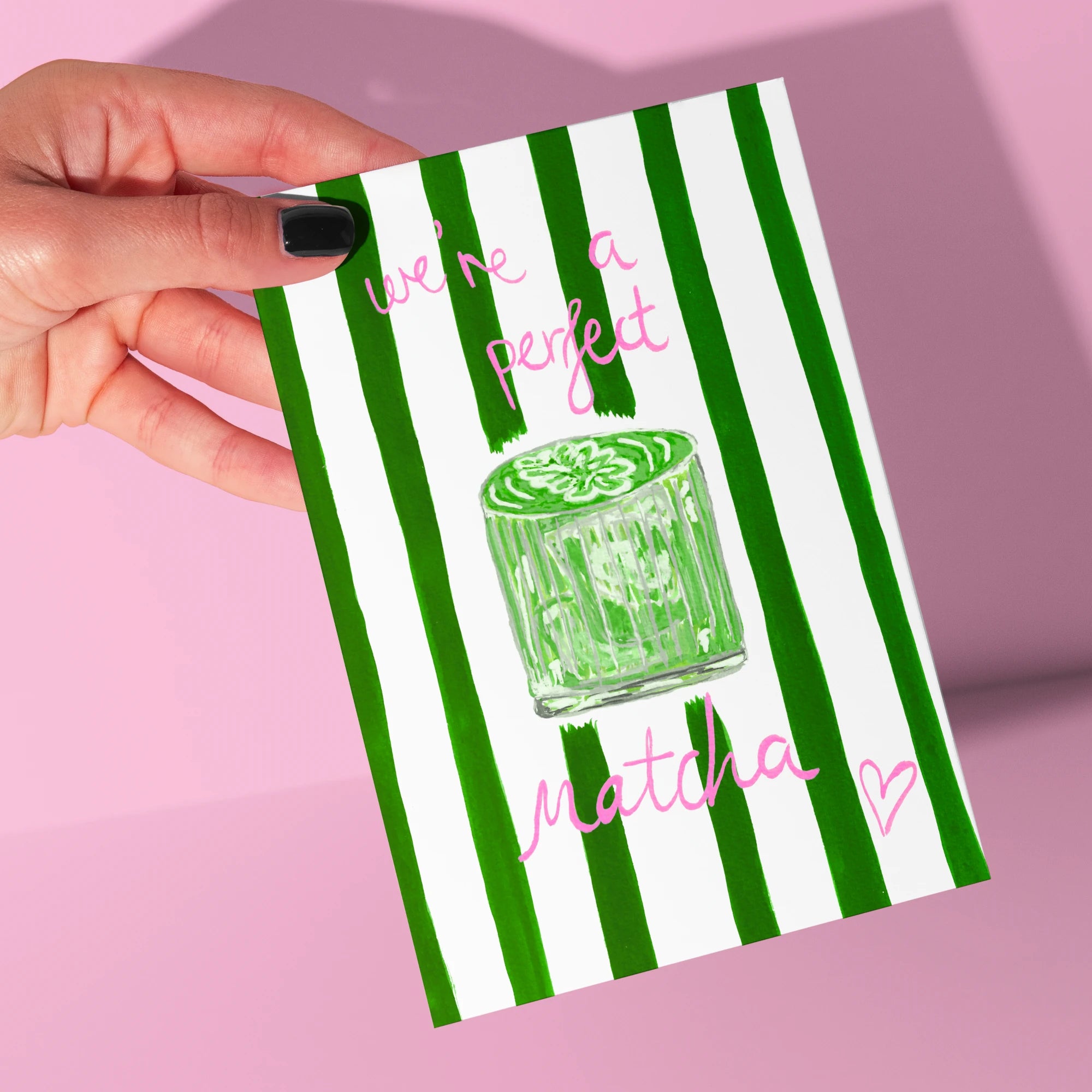 We're A Perfect Matcha Card by Tecari Designs being held up against a pink background
