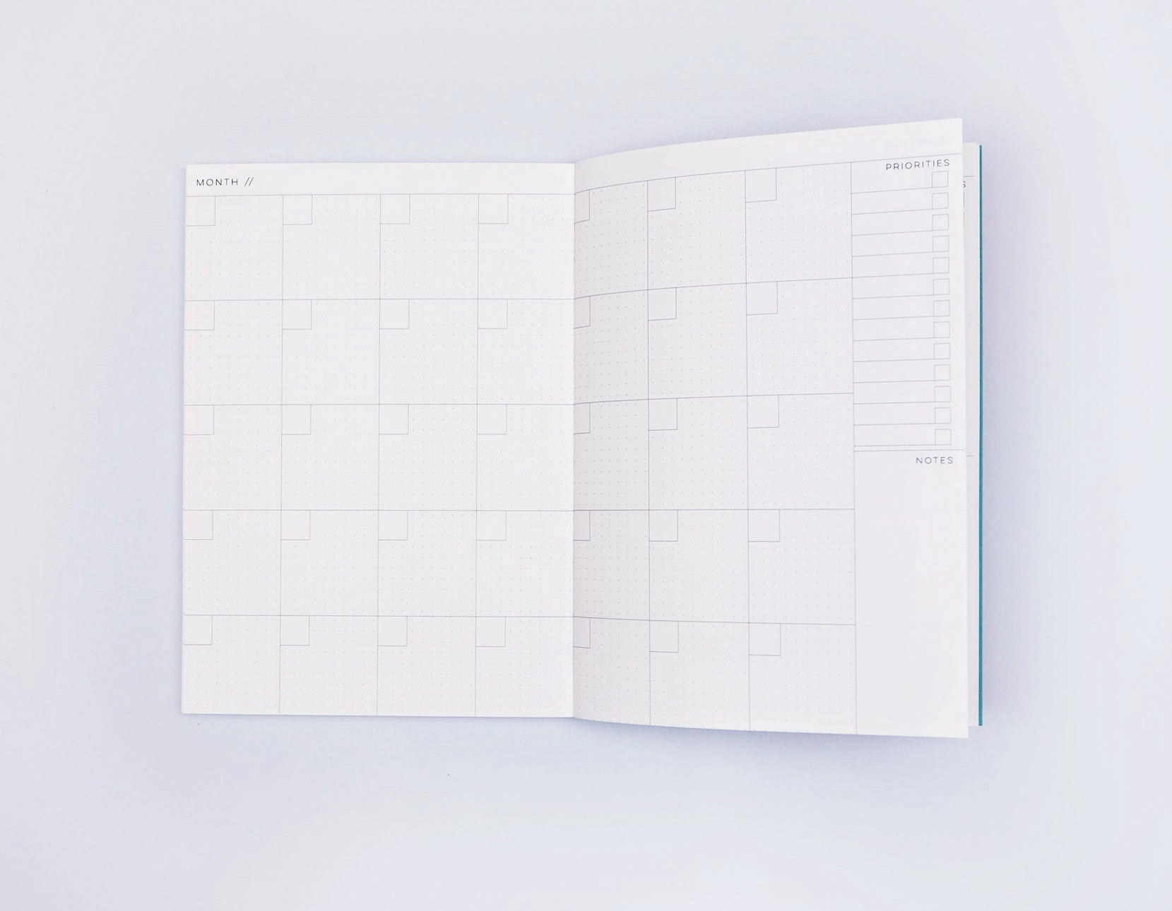 The Completist Miami No.1 Weekly Lay Flat Undated Planner A5 internal monthly view