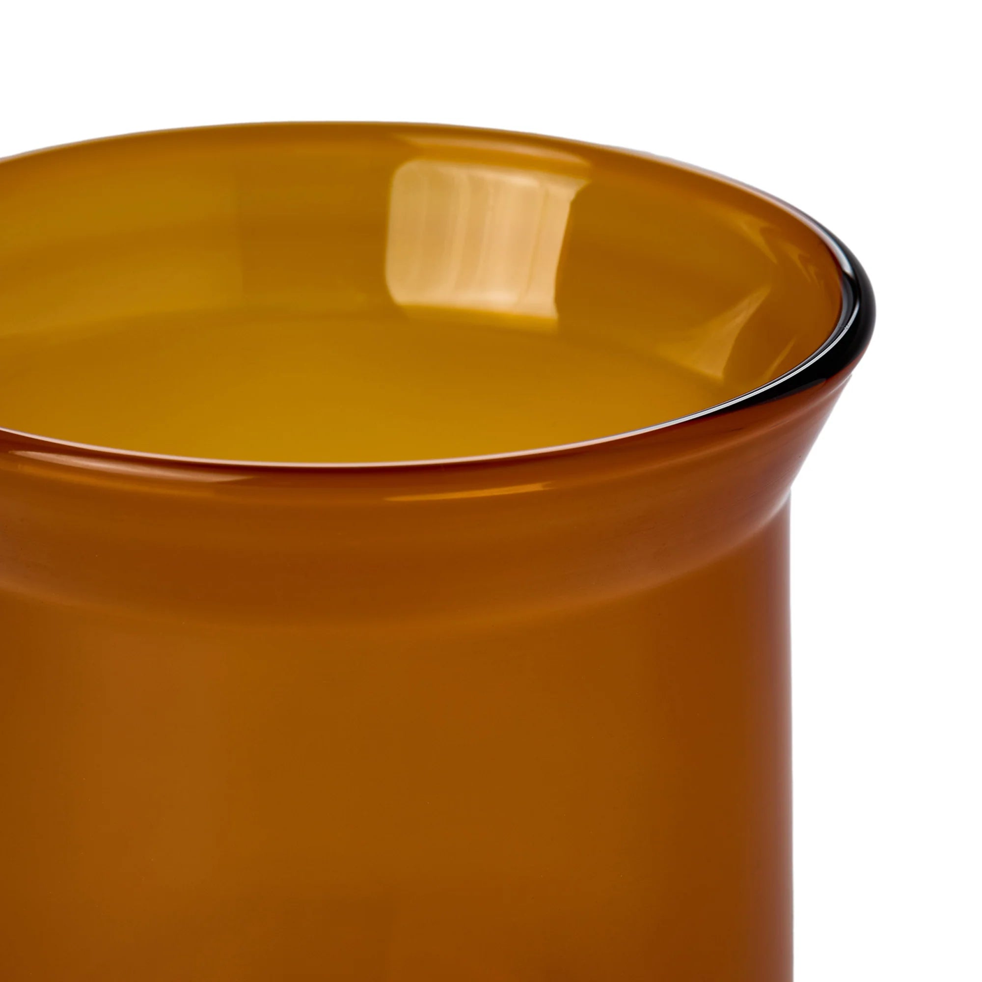 Close-up of a brown glass container with a white background
