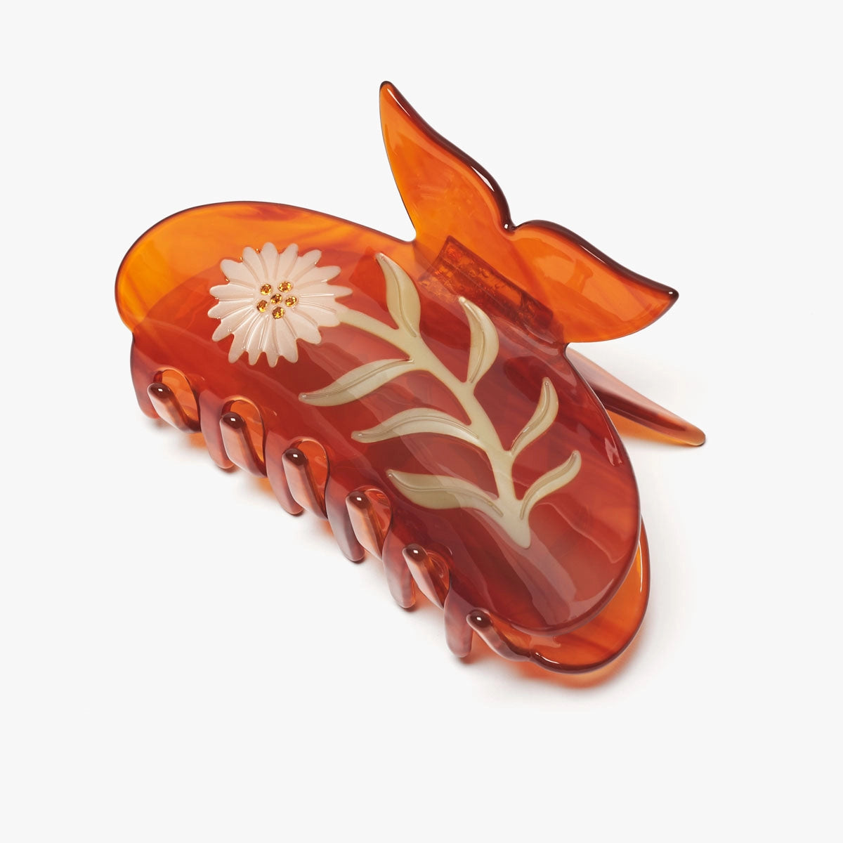 Winona Irene Chamomile Flower Butterfly Hair Claw in tortoiseshell acetate on a white background