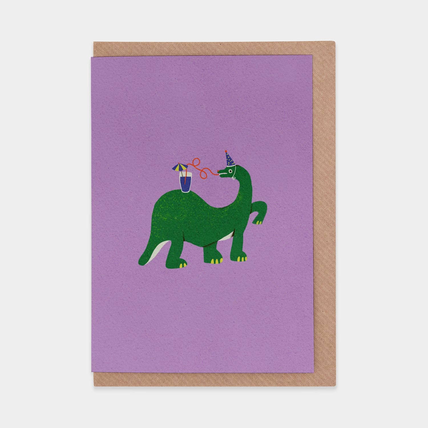 A purple card with a green dinosaur wearing a party hat and drinking a drink with a curly straw